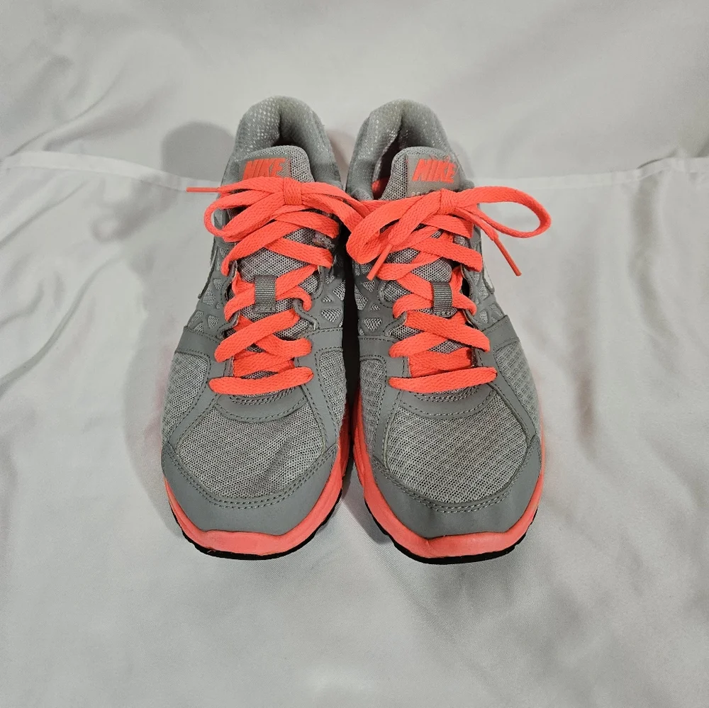 Nike neon pink and grey athletic shoes women's size 7.5